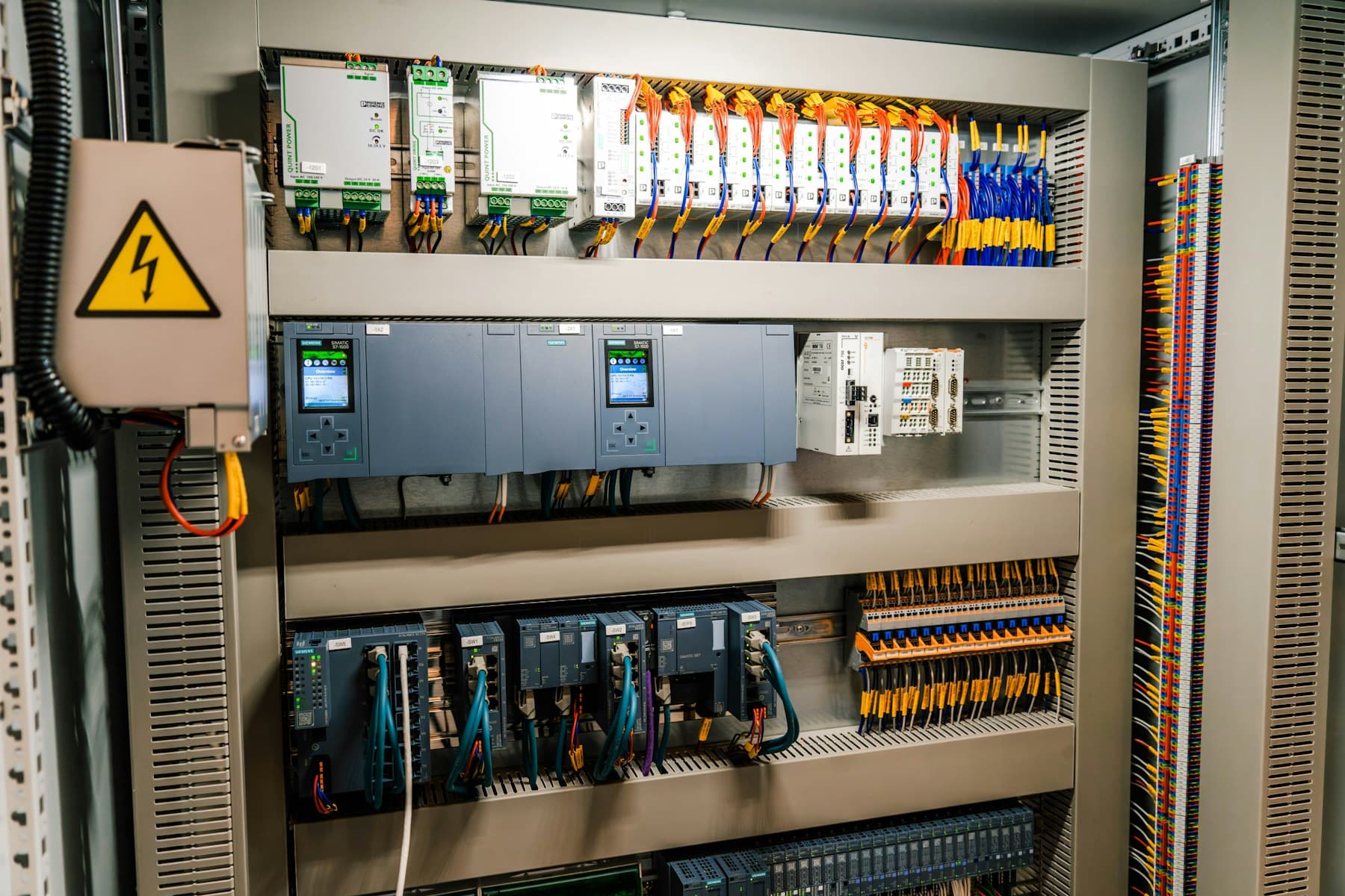 Industrial electrical control panel with organized wiring